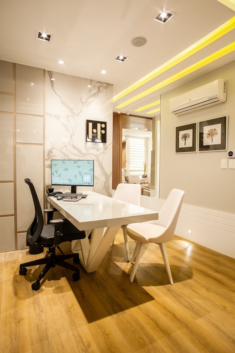 Modern home office with sleek design, computer desk, ergonomic chair, and minimalist decor. Perfect for productivity